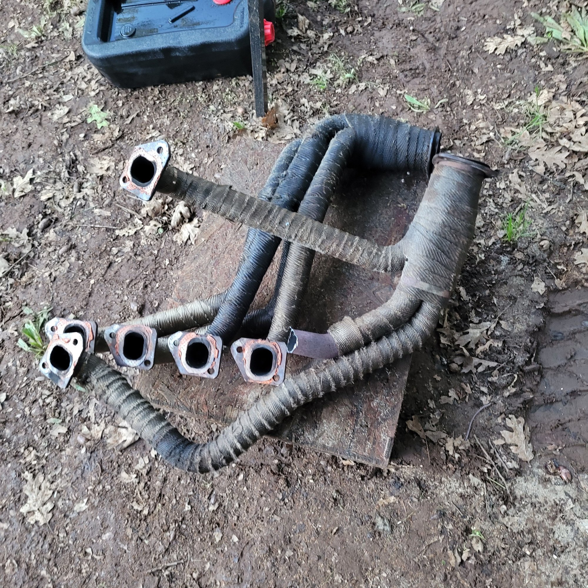 Removed the oil soaked header wraps to find alot of holes amd very thin spots.