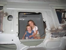 I have several pictures of our grandkids and the truck during the restoration process.  This is one of the more unique pictures taken a few years ago.  The youngest one turned seven a few days ago.
Grant