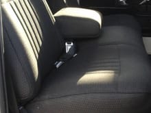 I took a 90 F150 seat and got it re upholstered, Ilike the arm rest.