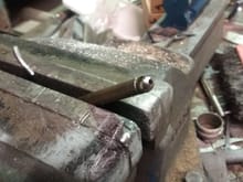 Hi sorry very difficult to get a good photo , took about 10  , you need to add this little ground flat to the pushrod  use the side of the bench grinder stone  ( only grind  one end )the rocker end . . Cheers 