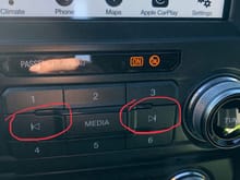 These buttons under the radio cycle through all of the XM stations and am/fm. 