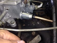One of the mystery hoses and the port on the carb