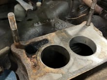 Rained out so I spent most of the day ripping carburetor apart. Kit should come tomorrow. There is rust in one corner. Is my spacer warped? Or was it just not torqued down correctly? Thanks in advance.