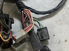 This is what the harnesss would look like when it exits the firewall notice the rubber style light connectors that only come a few inches back from the grommet instead of the green and gray connectors 