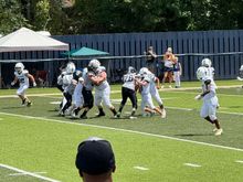 My grandson’s team is in the gray and black. The Outlaws. 