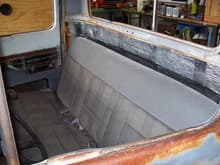 Bench seat from chry minivan, temp until a better one is found. New gas tank and cab insulation.