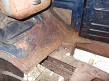 Cutting out the rusted floor pan