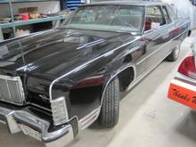 76 Lincoln before the new vinyl top was installed.  Notice there are no door handles??? :)