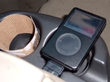 iPod adapter cable is routed through center console