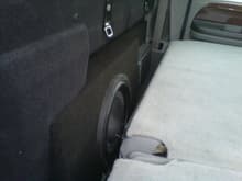 12&quot; subwoofer and amp in custom enclosure behind the seat.