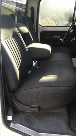 I took a 90 F150 seat and got it re upholstered, Ilike the arm rest.