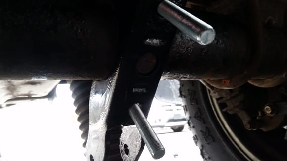 Lower shock mounts drilled out and back on axle