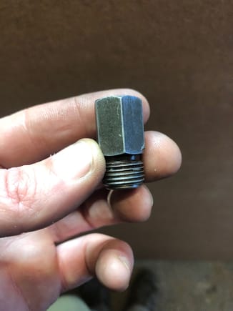 Weird fitting. Has 3/8 reverse flare threads and then seems to be 1/8 NPT female, but the fitting screws way in so I don't think that's the correct thread.