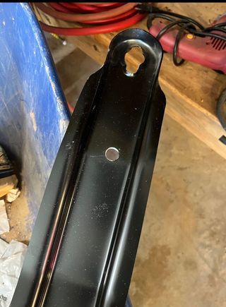 Drilled a hole 5” from the end of the carrier making the holes at both ends 44” apart