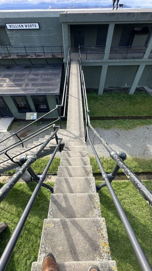 Ladder from ground level (to the left) to the battery level gang way and up to the Fire Directors Tower..  Daughter made it up to the tower without much problem...Acrophobia kicked in and coming down was interesting.  The Warden refused to go up and kept both feet on the ground.