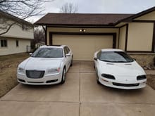 On the right, my wife's '94 Camaro. On the left, my former 2012 300C AWD Hemi.