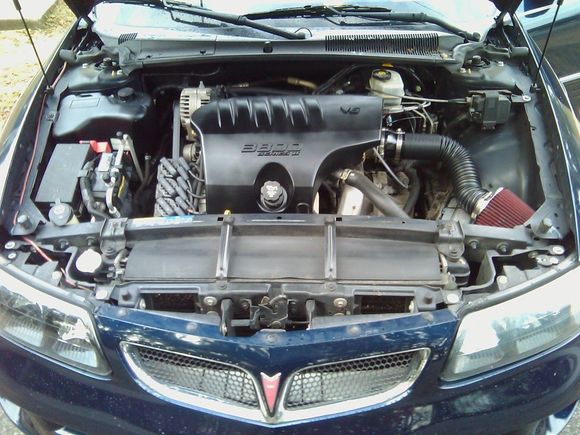 Painted the coolant reservoir and the L36 engine cover black to go along with the theme of my car