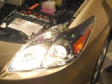 2010 Toyota Prius Drivers Side Headlight, High Beams On.