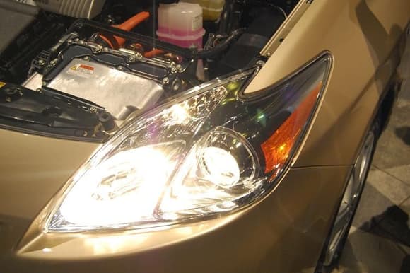 2010 Toyota Prius Drivers Side Headlight, High Beams On.