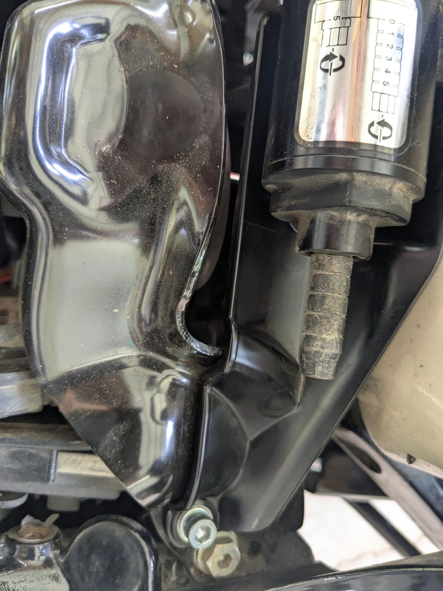 Heres what they did to mine installed a plastic piece underneath it .