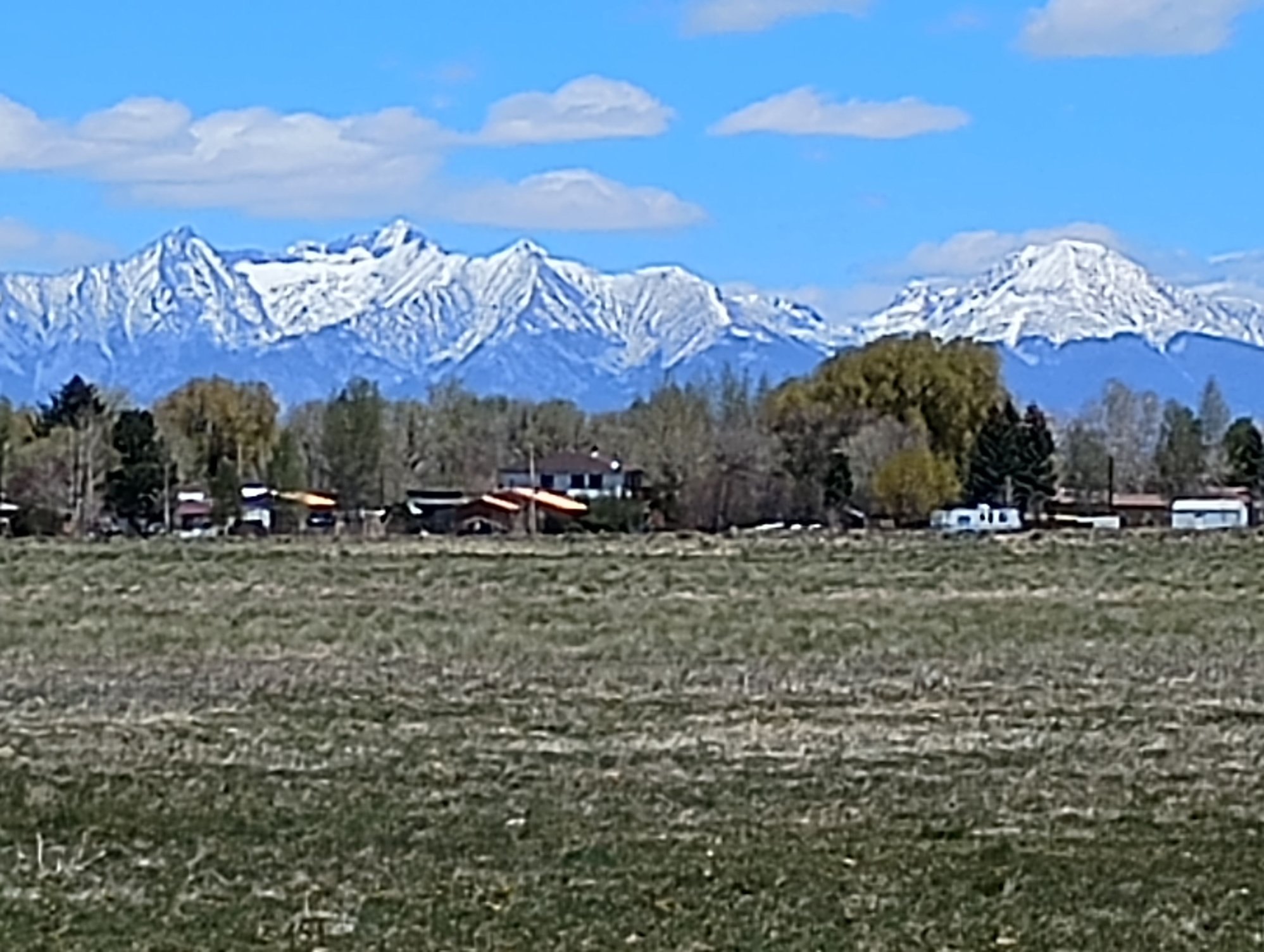 A lot of snow still on the mountain tops.