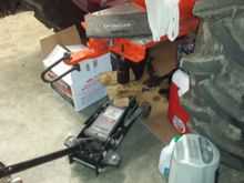 Use the floor jack to "press" it into place