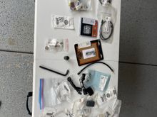 Bunch of random stuff, sold as lot. Connectors, connector terminals, harnesses, box hex wrench for the transmission check stick, clutch adjustment tool FirePro-m8 touring…etc.