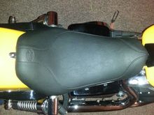 I did a write up on this seat.  Don't know where it went. 
Just got the seat on.  So far it is very comfortable.  Lol!
I'm 6'2" and it definitely drops you back and down. The sitting surface looks to be same as stock. If the temp ever warms up, I'll write a review. Haha. Overall a cool looking look. ..