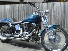 My 06 Softail Springer in N.Z.
BG3 exhaust, Hyper Charger Air intake flush mounted fuel gauge and cap. Heaps of other extras