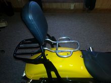 Clipped on the existing luggage rack.
