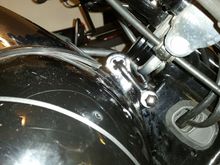 tighten arm bolts and nut on backbone bolt.  i reused the stock nut and washer.