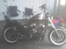Not a great pic (dropped my phone and cracked the camera) but...it blends in. It will leave some oul down the pipes and oil tank if im riding her hard but...oh well.