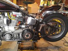 .030" is the max, I was at .0119" so clean up the rear tire a little, throw the chain guard and drive chain back on, so I can torque down the clutch nut and compensating sprocket nut.