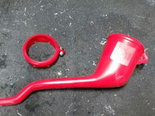 I cut the top off a Redline oil funnel to form the top of the cup holder.