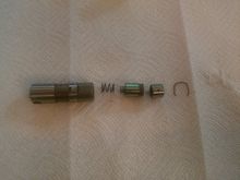 this is how the "C" lifter comes apart, note the 2 piece plunger. more on this later