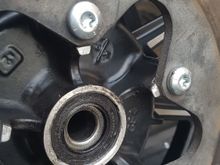 Mag rotor side. This is where im havinf the issue, the original spacer going here cannot go deep enough, and pushes the wheel way too far to belt side.