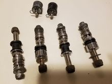 There are 2 1/4inch spacers mentioned on Cycle Visions website for use on Dyna models. I do not have them.