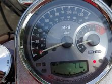 What is the red dot for between the digital display and the check engine light, below the tach? 