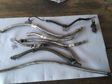 Here you can see how bad the oil lines were on this Machine, they did not even use the same type on all the lines ! At the top of this photo you can see the rear brake line that was also replaced with an OEM NOS 1