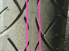 This goes around the whole tire, looks like its from the tire mould they pop the tire out of.