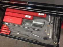 In this drawer I have more torque wrenches which are matco 3/8 and 1/2 drive and my snap on 1/4 drive. My extra long handle ratchet is a 1/2 drive snap on. Works great for axles. I also have my lady feet and snappy pry bars. Some primary locking tools, seal puller and caliper piston spreaders.
