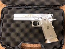 My grail gun. This is a 2011 STI 100th Anniversary Edition in honor of the Colt 1911 .45 cal. Took me 6 month to decide before I jump the gun on this beauty. 