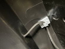 Instead of routing the wire on the top of the lid, I drilled a hole under where the light attaches to the lid. 