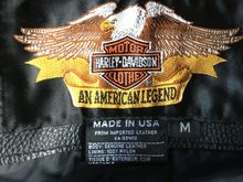 This is the bid tag on the inside lining by the neck.