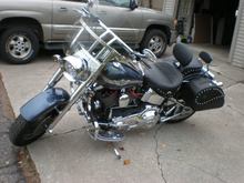 Lindby crash bars, chrome swing arm,all 100yr badges that HD make