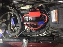 EarthX cable under the seat and above the battery.