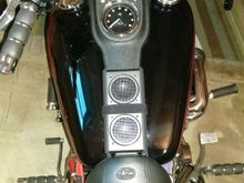 Air raid on my fxdl. Or kuryakyn thunder road speaker on handlebars...thunder road has to be hard wired...
