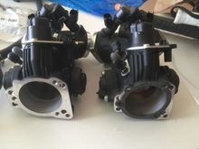 New throttle body on the left. SE 50mm with 4.9 injectors I believe