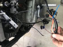 One white/black wire hooked to starter switch. From the switch I connected the black wire (that came installed on the switch) to the push button starter. The other terminal on the push button has the black/red wire that runs to the starter relay. 
