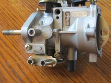 this Carb has no vacuum for the VOES & has the 2 throttle Push Pull Cable set up . . . 